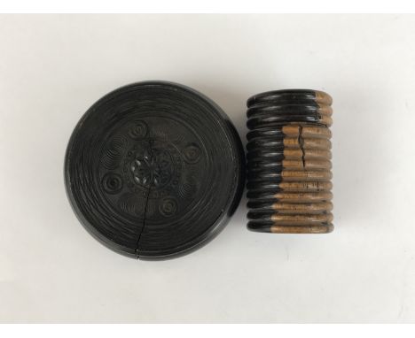 A 19th Century turned lignum vitae screw-lidded box, together with an engine-turned wooden pocket snuff box