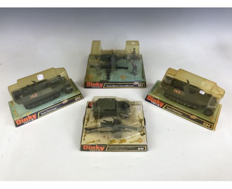 Vintage military Dinky Toys, including 662 Static 88mm Gun with crew, 617 Volkswagen KDF and 50mm P.A.K Anti-Tank Gun, and 69