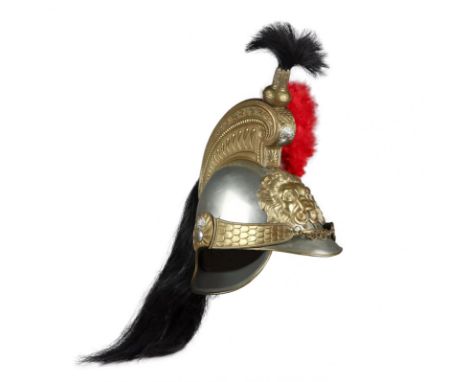 A stunning mid-19th century Belgian cuirassier or cavalry officer"²s helmet, embellished with a lion"²s head patch, brass cre
