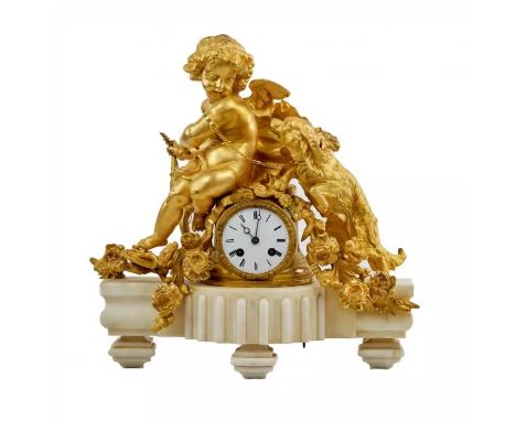 Mantel clock Putti with a dog&nbsp;, the sculpture is installed on a marble base. The inscription on the sculpture is Phillip