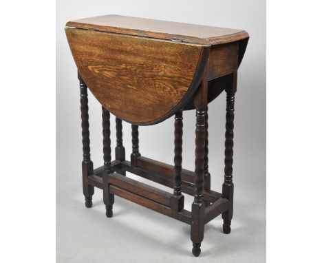 A Mid 20th Century Oak Bobbin Gate Leg Drop Leaf Narrow Occasional Table with Oval Top, 61cm Long 