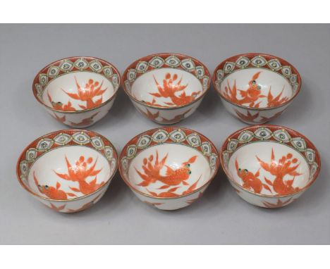 A Set of Six Chinese Porcelain Tea Bowls, C.1940's, Decorated with Pop Eyed Goldfish in Orange Enamel Enriched with Gold High