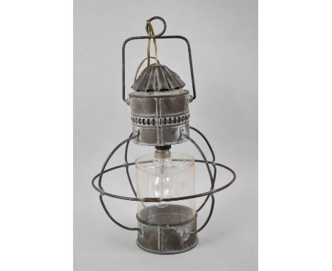 A Ceiling Hanging Metal Light Fitting in the Form of a Lantern, 34cm high 