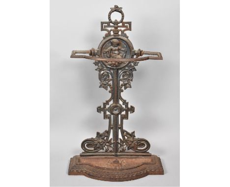 A Reproduction Cast Iron Stick Stand with Removable Base Tray and Decorated with Seated Cherub, 75cm high 