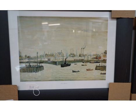 A framed Lowry print 