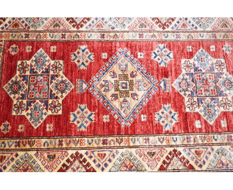 A vintage floor rug 140x80cm