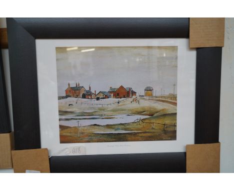 A framed Lowry print 