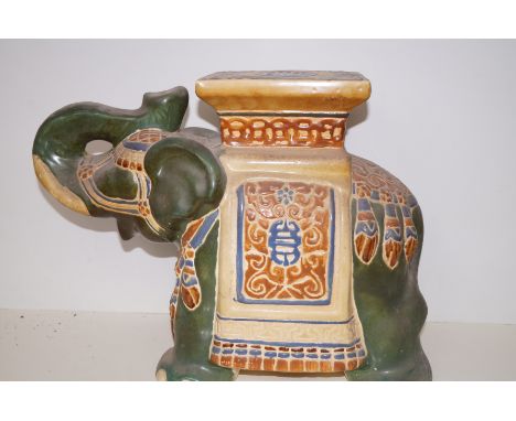 A ceramic elephant plant stand 38cm