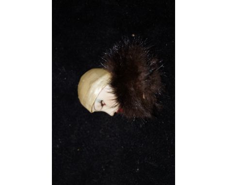 Art deco pin brooch with ceramic face and possibly mink fur liner