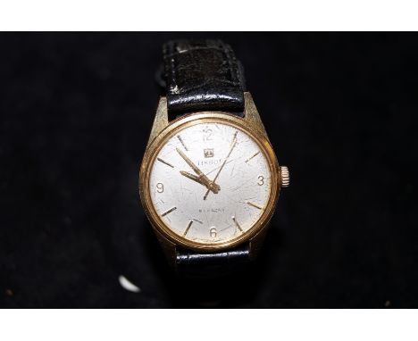 A Tissot  Seastar vintage wristwatch, currently ticking, not tested for time accuracy, scratch on the dial at 5 o'clock 