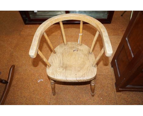 A vintage oak child's chair