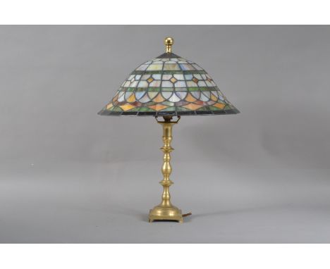 A modern Tiffany style table lamp, multi-coloured shade, on a classical style brass column and base, 47cm high, untested and 