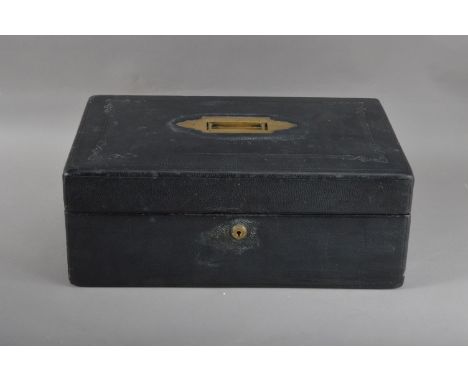 A 20th century Austin of Dublin black leatherette document case, brass recessed carrying handle, gilt makers name on the remo