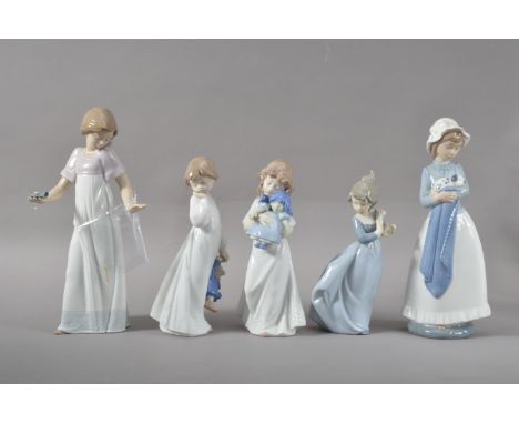 Five Nao porcelain figurines, all of girls, in a variety of positions, the tallest (a finger AF), 26cm high, the shortest 19c