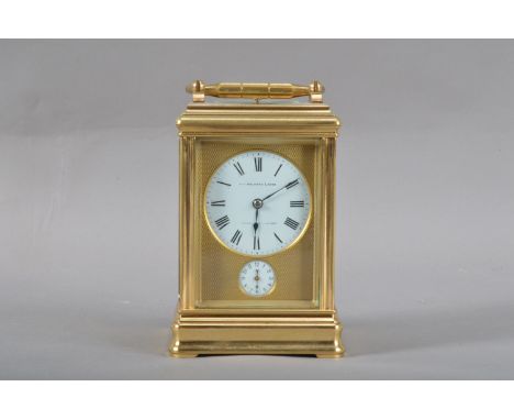 R.H. Halford &amp; Sons. Of London, a late 19th/early 20th century brass repeating carriage clock, the enamel face with Roman