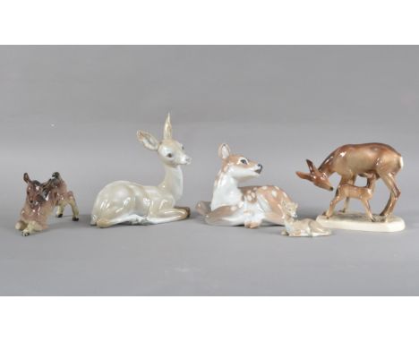 A collection of porcelain deer figurines, comprising two Lladro, Royal Copenhagen and two German marked examples, all marked 