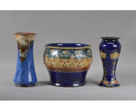 A Royal Doulton stoneware planter/ jardiniere, numbered '5887' and 18.5cm H x 24cm W, together with two Royal Doulton vases, 