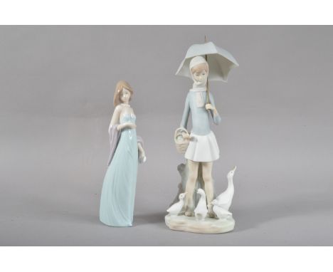 Two Lladro porcelain figurines, comprising a bisque figurine if a young girl with a parasol and ducks, 26cm high, and an eleg