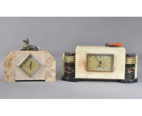 An art deco faux marble mantel clock,  diamond shaped dial, with Arabic numerals, mounted with a metal prone dog, with key 25