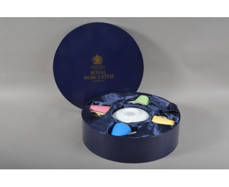 A 20th century Royal Worcester porcelain tea cup and saucer set, cased, to commemorate HRH Prince Philip's 80th birthday, all