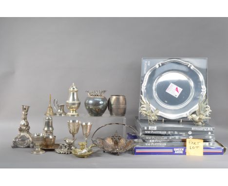 A large collection of silver plated items, to include a rococo style candlestick 19.5cm high, baskets, cutlery, a large moder