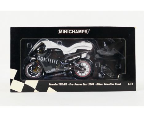 Minichamps - A boxed 1:12 scale limited edition Valentino Rossi Yamaha YZR-M1 pre-season 2004 test bike # 122006186. The mode