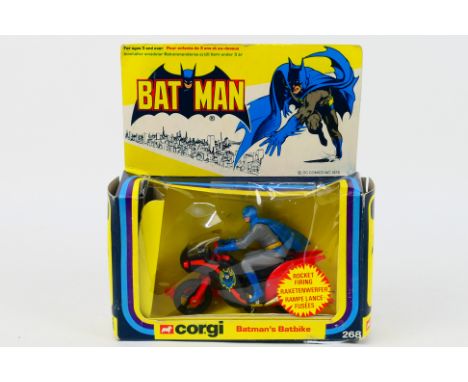 Corgi - A boxed Corgi #268 Batman's Batbike. The black bike with Batman figure, has a couple of small rubs to gold coloured e