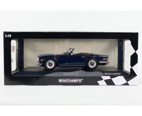 Minichamps - A boxed die-cast model limited edition 1:18 scale Minichamps #155 132032 1973 Triumph TR6 - The model - which is