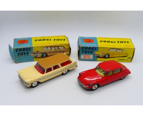 Corgi - 2 x models, a Citroen DS19 in red # 210S and a Plymouth Sports Suburban station wagon in cream # 219. They show signs