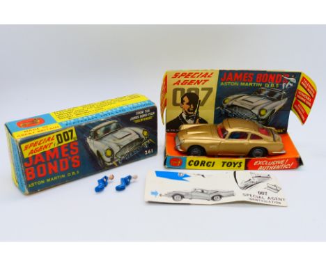 Corgi Toys - A boxed Corgi #261 James Bond’s Aston Martin DB5. The model in gold with red interior and wire wheels,has some c