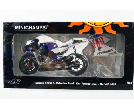 Minichamps - A boxed 1:12 scale Valentino Rossi Collection Yamaha YZR-M1 2009 Moto GP bike # 122093046. The model appears Min