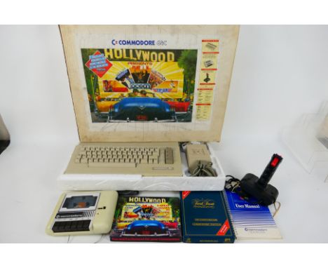 Commodore - A boxed Commodore 64C Hollywood edition complete with the keyboard, cassette deck, joystick, user manual and 9 x 