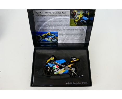 Minichamps - A boxed 1:12 scale Valentino Rossi Aprilia 125ccm 1996 GP bike # 122960046. The model appears Mint in a Good box