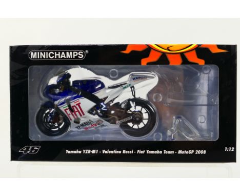 Minichamps - A boxed 1:12 scale Valentino Rossi Collection Yamaha YZR-M1 2008 Moto GP bike # 122083046. The model appears Min