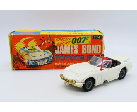 Corgi Toys - A boxed Corgi Toys #336 James Bond Toyota 2000GT. The model comes with driver figure only and has has some play 