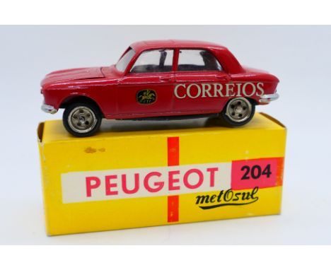Metosul (Portugal) - A boxed Metosul #24 Peugeot 204. The model in red with 'Correios'' decals to doors and bonnet, appears t