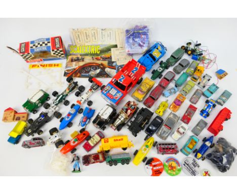 Scalextric - Corgi Toys - Dinky Toys - Politoys. In excess of Forty loose model cars appearing in Playworn to VG condition. L