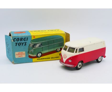 Corgi - A Volkswagen Delivery van in white and red # 433. The model shows signs of use and appears in Good condition overall.