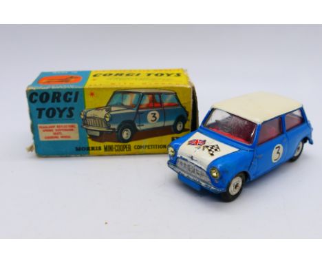 Corgi - A Morris Mini Cooper Competition model in blue with racing number 3 # 227. The car shows signs of use and appears in 