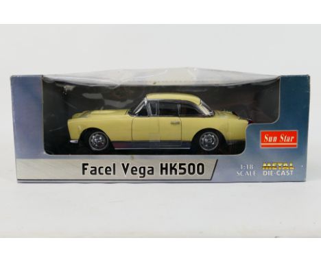 Sun Star - A boxed 1:18 scale Sun Star Facel Vega Hk500. The model appears to be in Mint condition housed in a Fair Plus dust