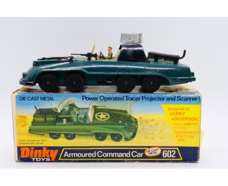 Dinky Toys -  A boxed Dinky Toys #602 'Gerry Anderson's' Armoured Command Car. The model in dark green with black plastics an