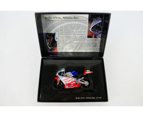 Minichamps - A boxed 1:12 scale Valentino Rossi Aprilia 125ccm 1997 GP bike # 122970046. The model appears Mint, the box is G
