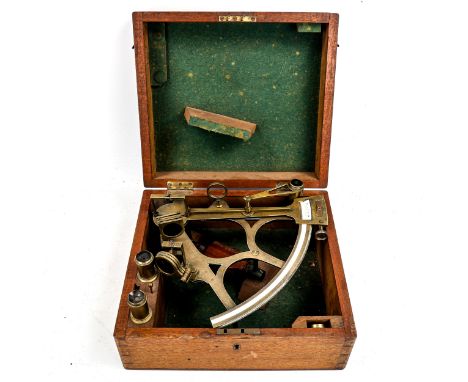 A brass sextant by Feathers & Son of Dundee, with ivory scale and spare lenses in original fitted teak case1 of the coloured 