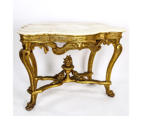 An ornate 19th century French carved giltwood console table, with original moulded and shaped white marble top, and cross str