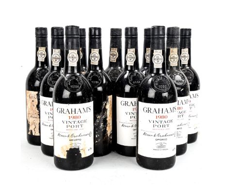 11 bottles of W & J Graham's 1980 Vintage Port, in original wooden box.From local private cellar, some label damage and loss 