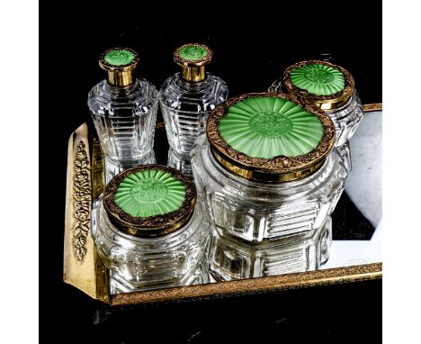 A glass and green enamel dressing table set, on brass-mounted mirrored stand, stand length 35cmAll in good original condition