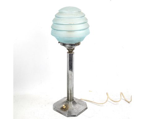 An Art Deco chrome plate table lamp, with original blue glass shade, height 45cmGood original condition 