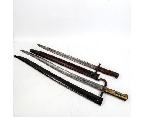 19th century sword bayonet, with brass hilt and original metal scabbard, length 71cm, and a Great War Period bayonet, in leat