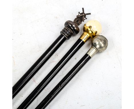 A nickel plate-topped military swagger stick, a walking cane with silver windmill top, and a walking cane with ivory and gilt