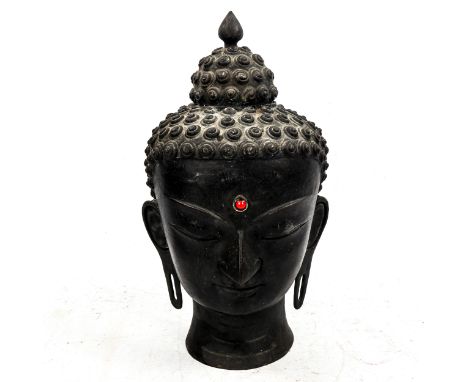 A Chinese patinated bronze Buddha head, height 39cm 